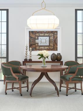 HC181/182-71 Ingold Dining Table shown in Chestnut finish, HC131-01 Kennis Dining/Game Chair shown in fabric HC143 with Chestnut finish and HC3079-51 Costigan M2M® Console shown in Truffle finish with light gold solid striping.