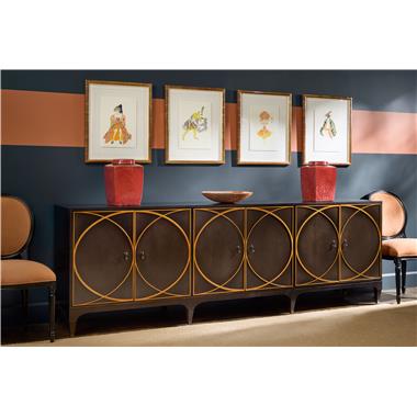 Room Scene: HC4600-70C3 Textures Credenza with (F14) Fret B door, (TPB) Tapered Base Antique Bronze Ferrule, Drop Pull Hardware N2 Antique Bronze with Hardware  (P2) Centered on Inner Edge shown in Kohl finish with Solid Bronze striping and HC3106-11 Louis XVI Dining Chair shown in HC457-41 fabric and HC467-38 on back in Kohl finish.