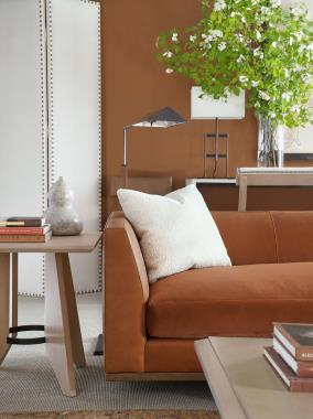 Room Scene: HC7227-90 - Boden Sofa shown in HC922 leather on body and HC328-47 fabric on seat cushion the throw pillows are in a COM fabric with Cypress finish; HC7279-70 Block Cocktail Table shown in Weathered Stone;  HC7292-70 - Weir Console 72" shown in Chalk finish; HC7271-70 - Sante End Table shown in Cypress finish and  HC7239-03 - Klio Counter Stool shown HC541 leather with Ecru finish.