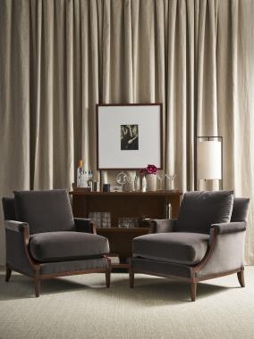 Room Scene: HC7270-STK Ozzie Bar / Console, standard in Truffle finish and HC7226-24 Denis Lounge Chair, fabric HC2948-67, shown in Truffle finish.
