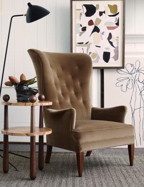 Room Scene: Hc8500-55 Bird Wing Chair shown in fabric HC2948-27 in Dark Walnut finish, with HC8687-10 Chad Walnut Side Table in Truffle finish with Olive Ash Burl.