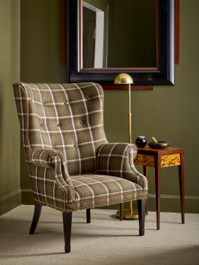 Room Scene: HCP286-STK Rufty Side Table and HC382-55 Isaac Wing Chair shown in HC469-79 fabric and Kohl finish.