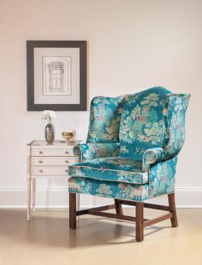 Room Scene: HC1271-55 Townsend Wing Chair shown in HC801-74 LIBERTY fabric and Truffle finish; HC6476-STK Portsmouth Side Table.