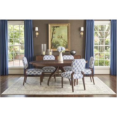 Room Scene: HC182-71/HC181-71 Ingold Round Dining Table shown in American Antique finish, HC4616-02 Cove Dining Chair shown in HC500-35 fabric with HC149 welt and American Antique finish and HC248-70 Felix Buffet shown in American Antique finish.