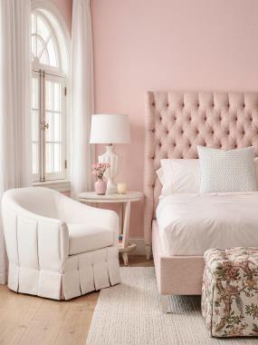 Room Scene: HC4522-10 Hattie Tufted King Headboard shown in HC504-50 fabric with Dove White finish; PE800-27 Gabby Chair shown in HC192-10 fabric with HC505-50 bias welt and HC505-50 fabric on inside pleat and buttons; HC186-71 Rye Round Side Table Bess shown in Cream Linen finish and HC192-10 on welt and buttons and PE6732-50 Radcliffe Ottoman shown in HC428-52 fabric.