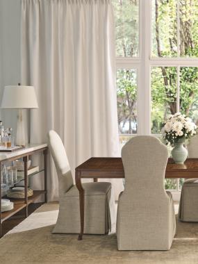 Room Scene: HC710-02 Lemont Side Chair shown in HC301-30 fabric, HC739-70 Hoof Dining table shown in Chestnut finish and HC299-70 Huxley Console/Bar shown in Chestnut finish.