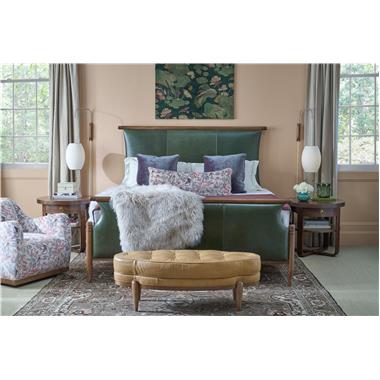 Room Scene: HC8662-10 Maren King Bed shown in HC146 leather and Truffle finish, HC8531-27 Luca Swivel Chair shown in HC483-73 fabric and Chestnut finish, HC8583-70 Beatrice Side Table shown in Truffle finish and HC8509-29 Fannie Ottoman shown in HC147 leather and Hable Grey finish.