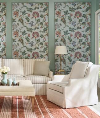 Room Scene: PE6722-30 Harrison Sofa with Dressmaker Skirt shown in HC281-70 body fabric with HC490-23 fabric on throw pillows, HC6722-01 Harrison Swivel Chair with Kick-Pleat Skirt shown in HC493-11 fabric with HC446-74 welt,  PE6742-50 Max Square Cocktail Ottoman shown in HC9004-92 leather and Chestnut finish and HCP9161-STL Kelli Round End Table.